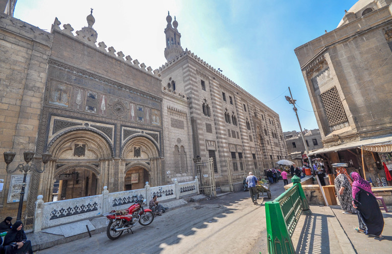 A large mosque with a central prayer area.