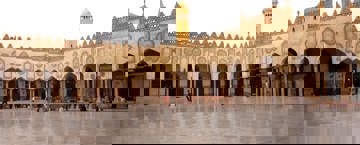 A large mosque with a central prayer area.