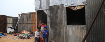 Poor family looking sadly