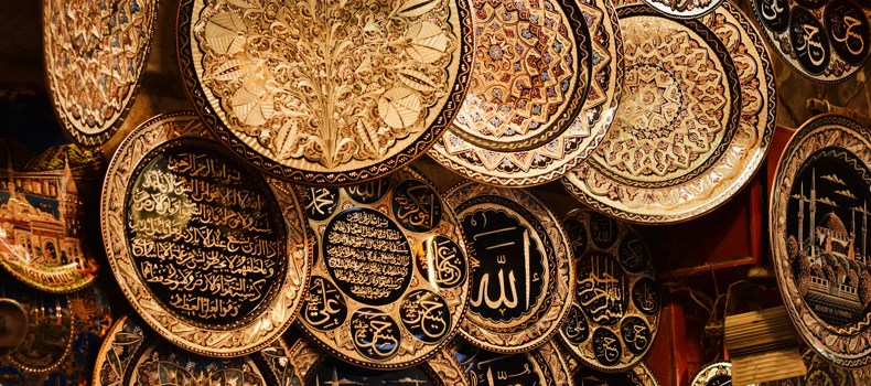 Decorative plates with Islamic calligraphy and patterns.